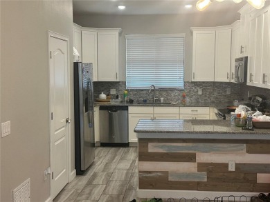 Short Salee check out this beautiful  townhome that has loads of on ChampionsGate Golf Resort in Florida - for sale on GolfHomes.com, golf home, golf lot