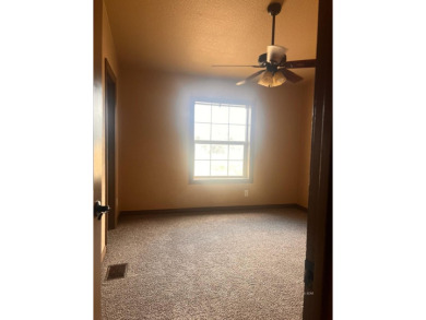 Welcome to 338 Flora Dr, nestled in the sought-after Golf Course on Spring Creek Golf Course in Nevada - for sale on GolfHomes.com, golf home, golf lot