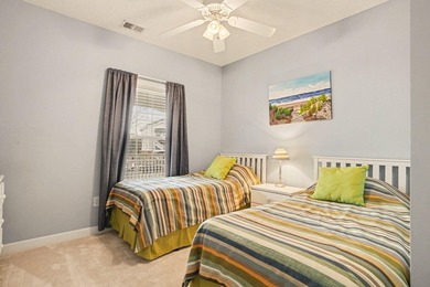 Welcome to this bright and beachy 2-bedroom, 2-bath end-unit on  in South Carolina - for sale on GolfHomes.com, golf home, golf lot