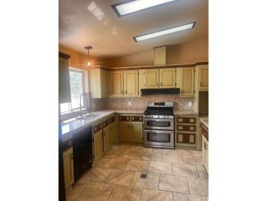 Welcome to 338 Flora Dr, nestled in the sought-after Golf Course on Spring Creek Golf Course in Nevada - for sale on GolfHomes.com, golf home, golf lot