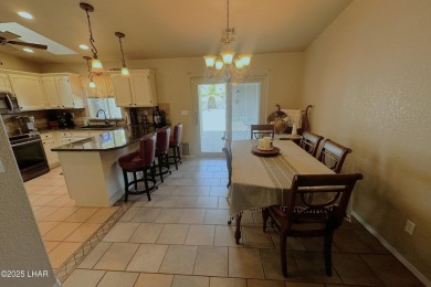 Gorgeous home on a fantastic and quiet cul-de-sac just a block on London Bridge Golf Course in Arizona - for sale on GolfHomes.com, golf home, golf lot