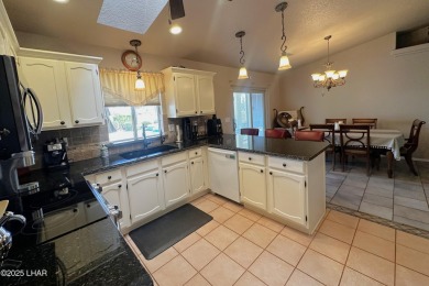Gorgeous home on a fantastic and quiet cul-de-sac just a block on London Bridge Golf Course in Arizona - for sale on GolfHomes.com, golf home, golf lot