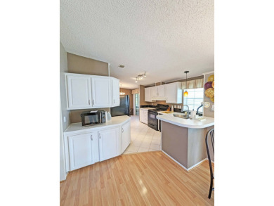 2 Bedrooms + Den | 2 Bathrooms | 1,344 sq  ft | $115,000 on Four Lakes Golf Club in Florida - for sale on GolfHomes.com, golf home, golf lot