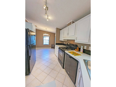 2 Bedrooms + Den | 2 Bathrooms | 1,344 sq  ft | $115,000 on Four Lakes Golf Club in Florida - for sale on GolfHomes.com, golf home, golf lot