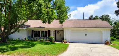 Welcome to this incredibly spacious three-bedroom, two-bathroom on Beacon Woods Golf Club in Florida - for sale on GolfHomes.com, golf home, golf lot