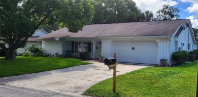 Welcome to this incredibly spacious three-bedroom, two-bathroom on Beacon Woods Golf Club in Florida - for sale on GolfHomes.com, golf home, golf lot