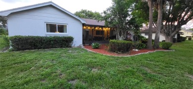 Welcome to this incredibly spacious three-bedroom, two-bathroom on Beacon Woods Golf Club in Florida - for sale on GolfHomes.com, golf home, golf lot