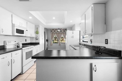 Welcome to your MOVE-IN READY OASIS in Kings Point, the premier on Falcon Watch Golf Club in Florida - for sale on GolfHomes.com, golf home, golf lot