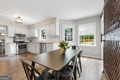 Updated 4-bedroom, 2 and a half bathroom home situated on on Braelinn Golf Club in Georgia - for sale on GolfHomes.com, golf home, golf lot