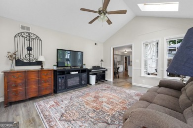 Updated 4-bedroom, 2 and a half bathroom home situated on on Braelinn Golf Club in Georgia - for sale on GolfHomes.com, golf home, golf lot