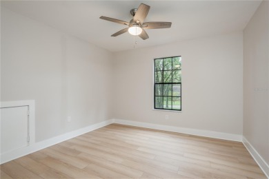 This beautiful newly renovated 4-bedroom/3-bathroom home in on Emerald Greens Golf Resort and Country Club in Florida - for sale on GolfHomes.com, golf home, golf lot