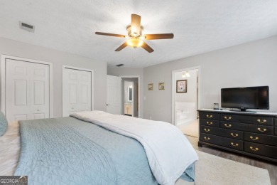 Updated 4-bedroom, 2 and a half bathroom home situated on on Braelinn Golf Club in Georgia - for sale on GolfHomes.com, golf home, golf lot