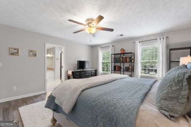 Updated 4-bedroom, 2 and a half bathroom home situated on on Braelinn Golf Club in Georgia - for sale on GolfHomes.com, golf home, golf lot