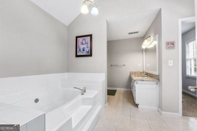 Updated 4-bedroom, 2 and a half bathroom home situated on on Braelinn Golf Club in Georgia - for sale on GolfHomes.com, golf home, golf lot