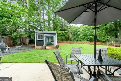 Updated 4-bedroom, 2 and a half bathroom home situated on on Braelinn Golf Club in Georgia - for sale on GolfHomes.com, golf home, golf lot