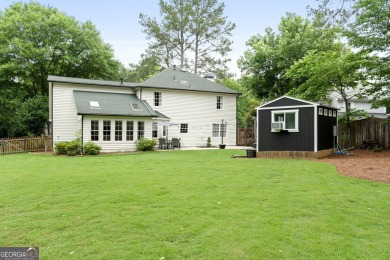 Updated 4-bedroom, 2 and a half bathroom home situated on on Braelinn Golf Club in Georgia - for sale on GolfHomes.com, golf home, golf lot