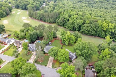 Updated 4-bedroom, 2 and a half bathroom home situated on on Braelinn Golf Club in Georgia - for sale on GolfHomes.com, golf home, golf lot