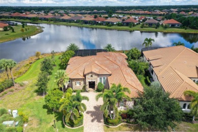 Positioned on a premier homesite with water on two sides and on Ritz-Carlton Members Golf Club in Florida - for sale on GolfHomes.com, golf home, golf lot