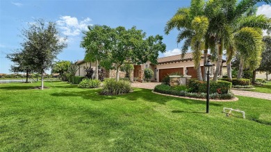 Positioned on a premier homesite with water on two sides and on Ritz-Carlton Members Golf Club in Florida - for sale on GolfHomes.com, golf home, golf lot