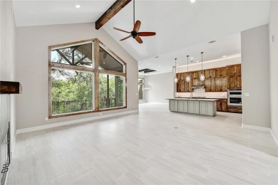 Escape into nature with this captivating one-story home nestled on Highland Lakes Golf Course in Texas - for sale on GolfHomes.com, golf home, golf lot