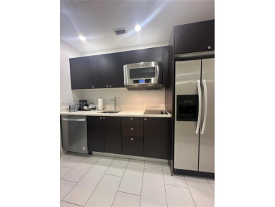 Fully furnished studio for sale in the heart of Downtown Doral! on Doral Golf Resort in Florida - for sale on GolfHomes.com, golf home, golf lot