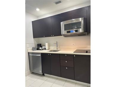 Fully furnished studio for sale in the heart of Downtown Doral! on Doral Golf Resort in Florida - for sale on GolfHomes.com, golf home, golf lot