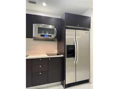 Fully furnished studio for sale in the heart of Downtown Doral! on Doral Golf Resort in Florida - for sale on GolfHomes.com, golf home, golf lot
