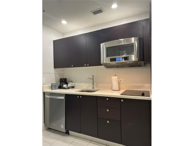 Fully furnished studio for sale in the heart of Downtown Doral! on Doral Golf Resort in Florida - for sale on GolfHomes.com, golf home, golf lot