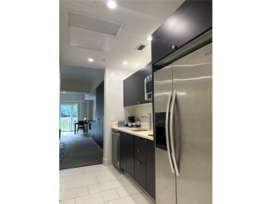 Fully furnished studio for sale in the heart of Downtown Doral! on Doral Golf Resort in Florida - for sale on GolfHomes.com, golf home, golf lot