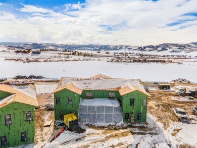 This great 2-bedroom 1.5 bath townhome is everything you need in on Headwaters Golf Course At Granby Ranch in Colorado - for sale on GolfHomes.com, golf home, golf lot