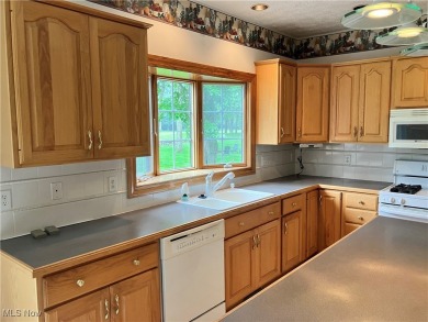 Welcome to 1254 Maxfli Dr. This beautiful brick Colonial is on Chenoweth Golf Course in Ohio - for sale on GolfHomes.com, golf home, golf lot