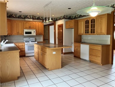 Welcome to 1254 Maxfli Dr. This beautiful brick Colonial is on Chenoweth Golf Course in Ohio - for sale on GolfHomes.com, golf home, golf lot