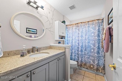 Cherished 3/2/2 in beautiful neighborhood with mature oak shade on Windsor Parke Golf Club in Florida - for sale on GolfHomes.com, golf home, golf lot