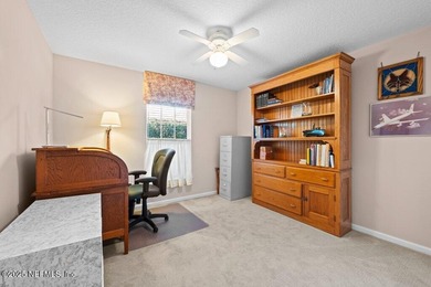 Cherished 3/2/2 in beautiful neighborhood with mature oak shade on Windsor Parke Golf Club in Florida - for sale on GolfHomes.com, golf home, golf lot