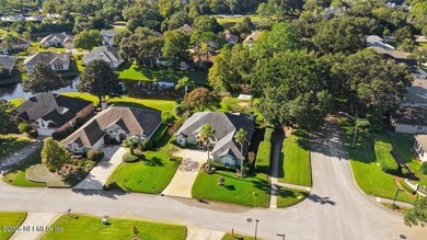 Cherished 3/2/2 in beautiful neighborhood with mature oak shade on Windsor Parke Golf Club in Florida - for sale on GolfHomes.com, golf home, golf lot