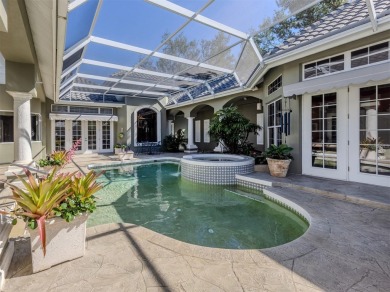 Timeless and traditional custom built Arthur Rutenberg courtyard on Plantation Golf and Country Club in Florida - for sale on GolfHomes.com, golf home, golf lot