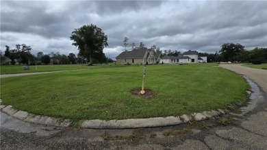 Beautiful, rare lot with pond view and the T off right out your on Carter Plantation Golf Course in Louisiana - for sale on GolfHomes.com, golf home, golf lot