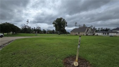 Beautiful, rare lot with pond view and the T off right out your on Carter Plantation Golf Course in Louisiana - for sale on GolfHomes.com, golf home, golf lot