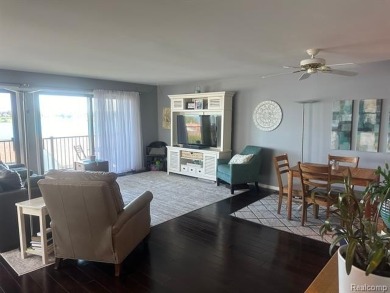 This stunning and spacious end unit condominium with premium on St Clair River Country Club in Michigan - for sale on GolfHomes.com, golf home, golf lot