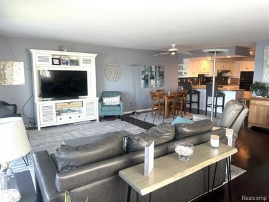 This stunning and spacious end unit condominium with premium on St Clair River Country Club in Michigan - for sale on GolfHomes.com, golf home, golf lot