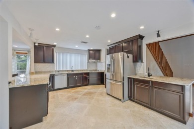 Welcome to waterfront living at its finest. This home is located on Seminole Lake Country Club in Florida - for sale on GolfHomes.com, golf home, golf lot