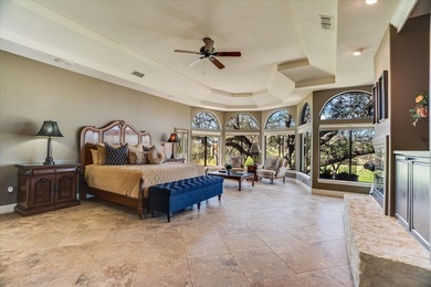 Situated on two premier lots along the #2 Green of Apple Rock in on Apple Rock Golf Course - Horseshoe Bay in Texas - for sale on GolfHomes.com, golf home, golf lot