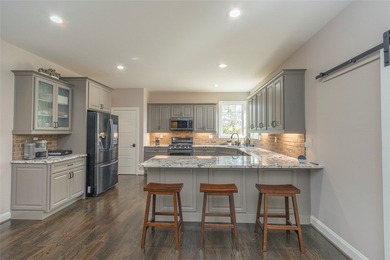 WELCOME HOME TO 310 BURNING TREE RD, BEAUTIFULLY POSITIONED ON on Cobbs Glen Country Club in South Carolina - for sale on GolfHomes.com, golf home, golf lot