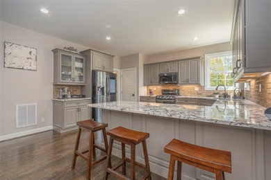 WELCOME HOME TO 310 BURNING TREE RD, BEAUTIFULLY POSITIONED ON on Cobbs Glen Country Club in South Carolina - for sale on GolfHomes.com, golf home, golf lot