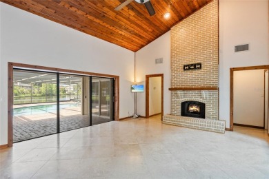 Welcome to waterfront living at its finest. This home is located on Seminole Lake Country Club in Florida - for sale on GolfHomes.com, golf home, golf lot