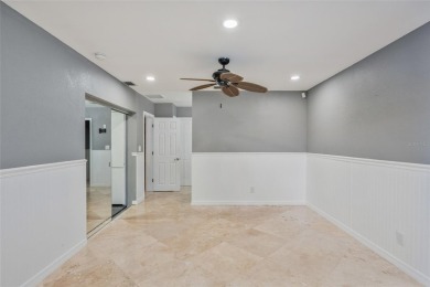 Welcome to waterfront living at its finest. This home is located on Seminole Lake Country Club in Florida - for sale on GolfHomes.com, golf home, golf lot