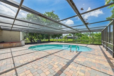 Welcome to waterfront living at its finest. This home is located on Seminole Lake Country Club in Florida - for sale on GolfHomes.com, golf home, golf lot