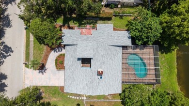 Welcome to waterfront living at its finest. This home is located on Seminole Lake Country Club in Florida - for sale on GolfHomes.com, golf home, golf lot
