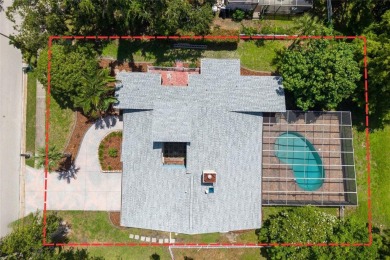 Welcome to waterfront living at its finest. This home is located on Seminole Lake Country Club in Florida - for sale on GolfHomes.com, golf home, golf lot