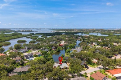 Welcome to waterfront living at its finest. This home is located on Seminole Lake Country Club in Florida - for sale on GolfHomes.com, golf home, golf lot